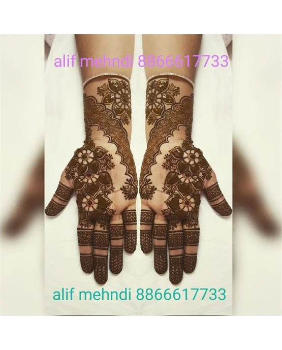 Filigree Vine Extension Blending Into Simple Full Hand Mehndi Design